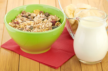 Delicious and healthy cereal in bowl with milk