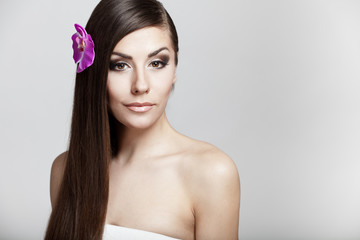 Fototapeta premium beautiful young brunette woman with long hair