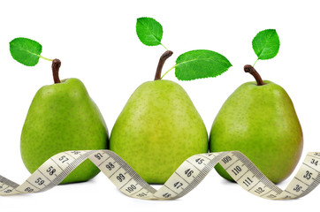 Pear with measuring tape over white