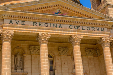 Detail of the facade of the Mgarr church and its inscription