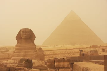 Wall murals Egypt The Sphinx and Pyramid of Khafre in a sand storm, Cairo