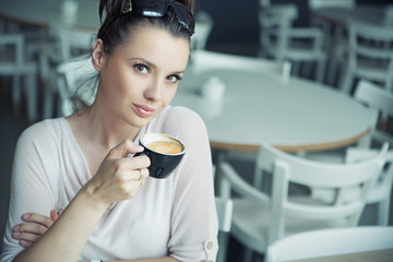 Mysterious smile of attractive girl