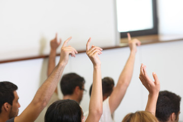 Students put hands up