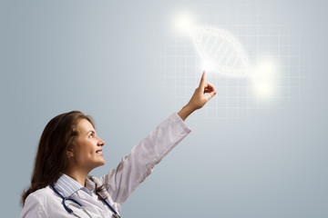 young woman doctor finger glowing DNA symbol