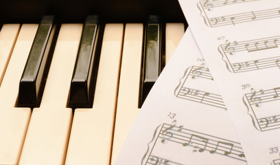 piano keyboard and sheetmusic