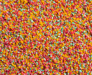 Multi colored candy drops as a background