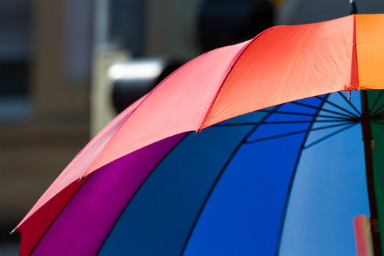 Umbrella featuring rainbow flag colors