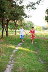 Happy middle-aged couple walking outdoors.