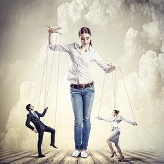 Businesswoman puppeteer