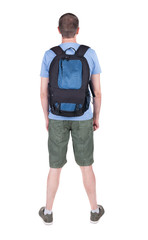 Back view of man with   backpack looking up.