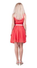 back view of standing young beautiful  woman