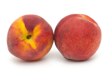 three ripe peaches