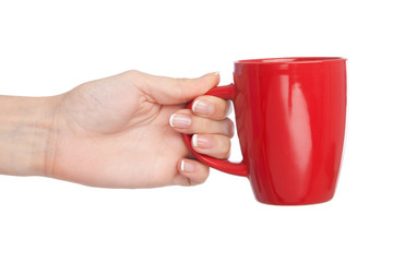 Obraz premium Hand holding a cup, isolated on white background