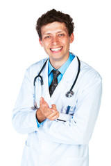 Portrait of a smiling male doctor showing finger at you on white
