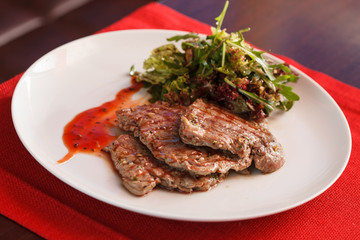 steak with salad