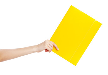 Female hand holding a folder