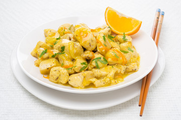 chicken fillet with orange sauce and parsley