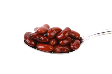 Preserve beans on a spoon.