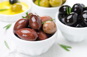 kalamata olives in a bowl close-up, horizontal