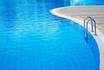 part of swimming pool with blue water