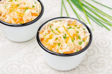 salad of pickled cabbage with carrots, green onions horizontal