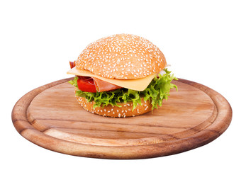 Hamburgers on wooden board isolated