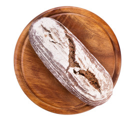 Bread on a wooden tray isolated