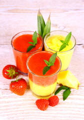 Raspberry, strawberry and pineapple smoothie mixed, deco