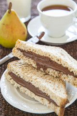 toast bread with creamy chocolate and tea, delicious breakfast