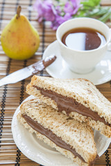 toast bread with creamy chocolate and tea, delicious breakfast