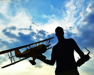 Fotobehang man with rc plane © gmddl