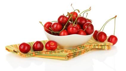 Cherry berries in bowl isolated on white