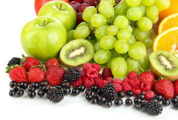 Fresh fruits and berries isolated on white
