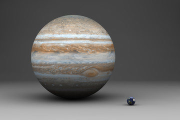 Die Planeten Erde und Jupiter im Größenvergleich © bischy