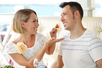 Beautiful couple having  romantic dinner at restaurant