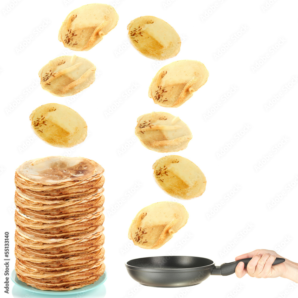 Wall mural frying pan with flying pancakes