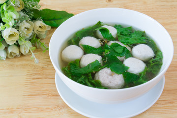 Thai style  soup with meatballs and vegetables