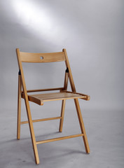 A wood foldable chair