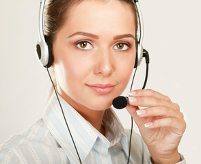 Beautiful business woman with headset. Call center