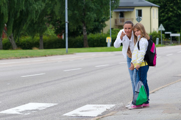 Teaching the rules before crossing the street on the school way