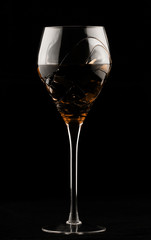 Wine glass with yellow potion