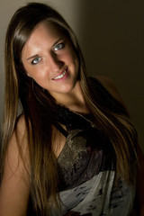Fototapeta premium Portrait of sexy woman posing in studio