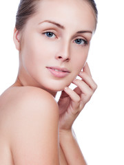 Beautiful face of young adult woman with clean fresh skin