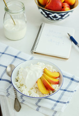 Breakfast with cottage cheese, fresh nectarines and sour cream