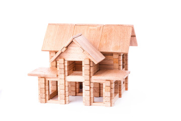 Toy wooden house isolated on white