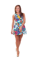 young beautiful happy girl in colorful dress. isolated on white