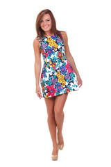 young beautiful happy girl in colorful dress. isolated on white