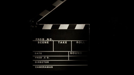 Film slate being clapped in slow motion