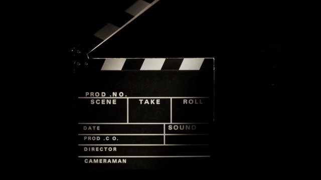 Film slate being clapped in slow motion