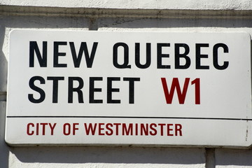 New Quebec Street sign